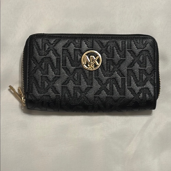 NX  Black Wallet with Monogram Pattern and Gold Emblem EUC - Picture 1 of 9